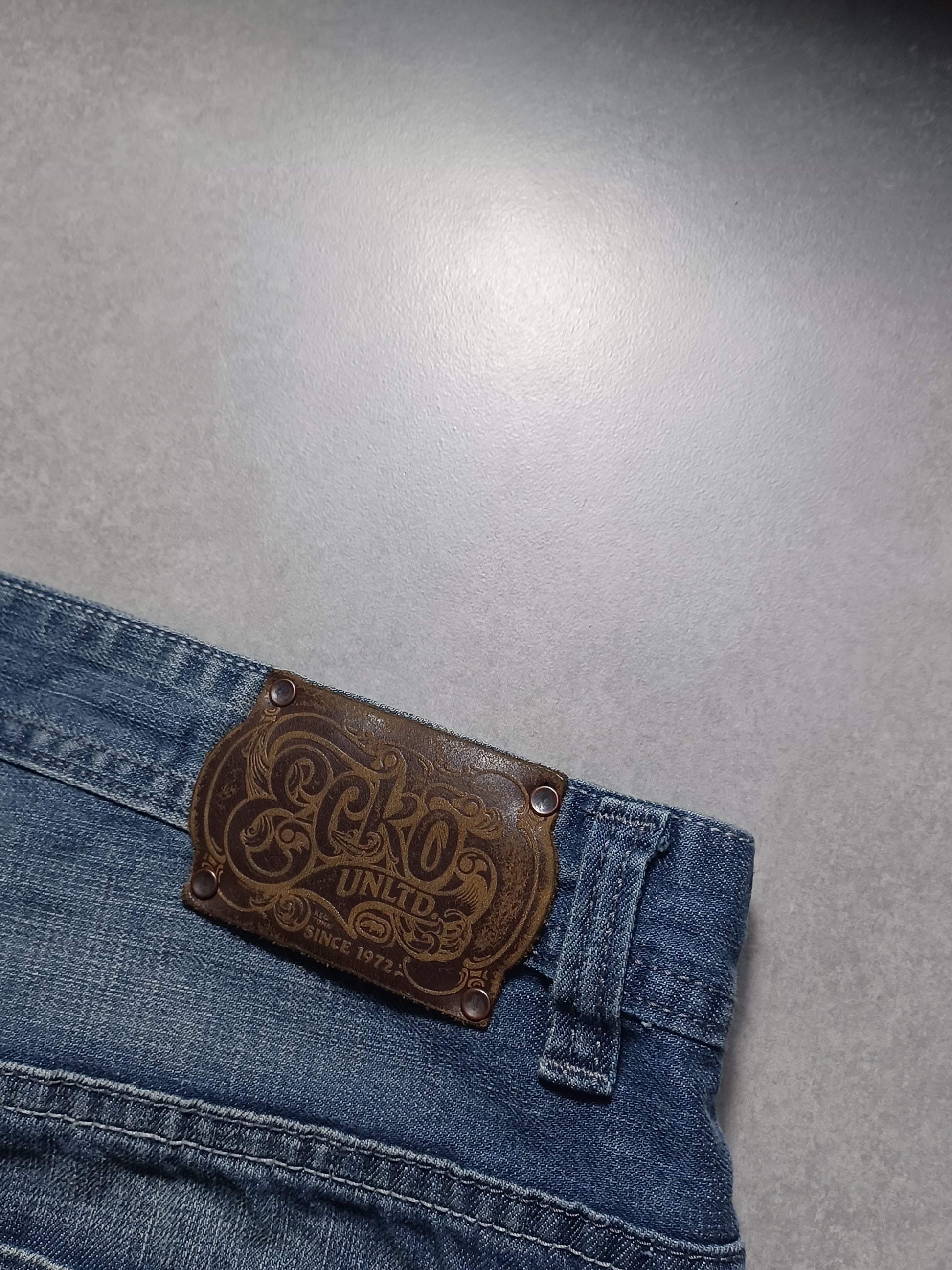 Niebieskie baggy jortsy Ecko.Untld