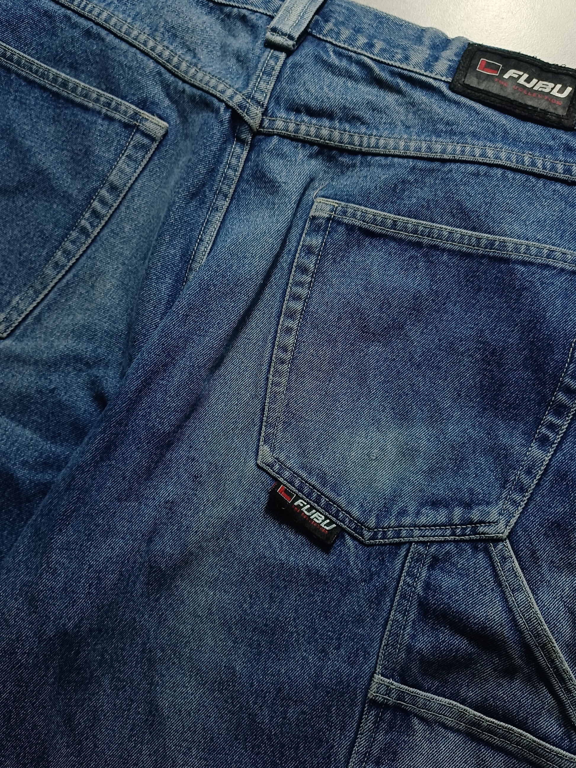 Niebieskie baggy jortsy FUBU