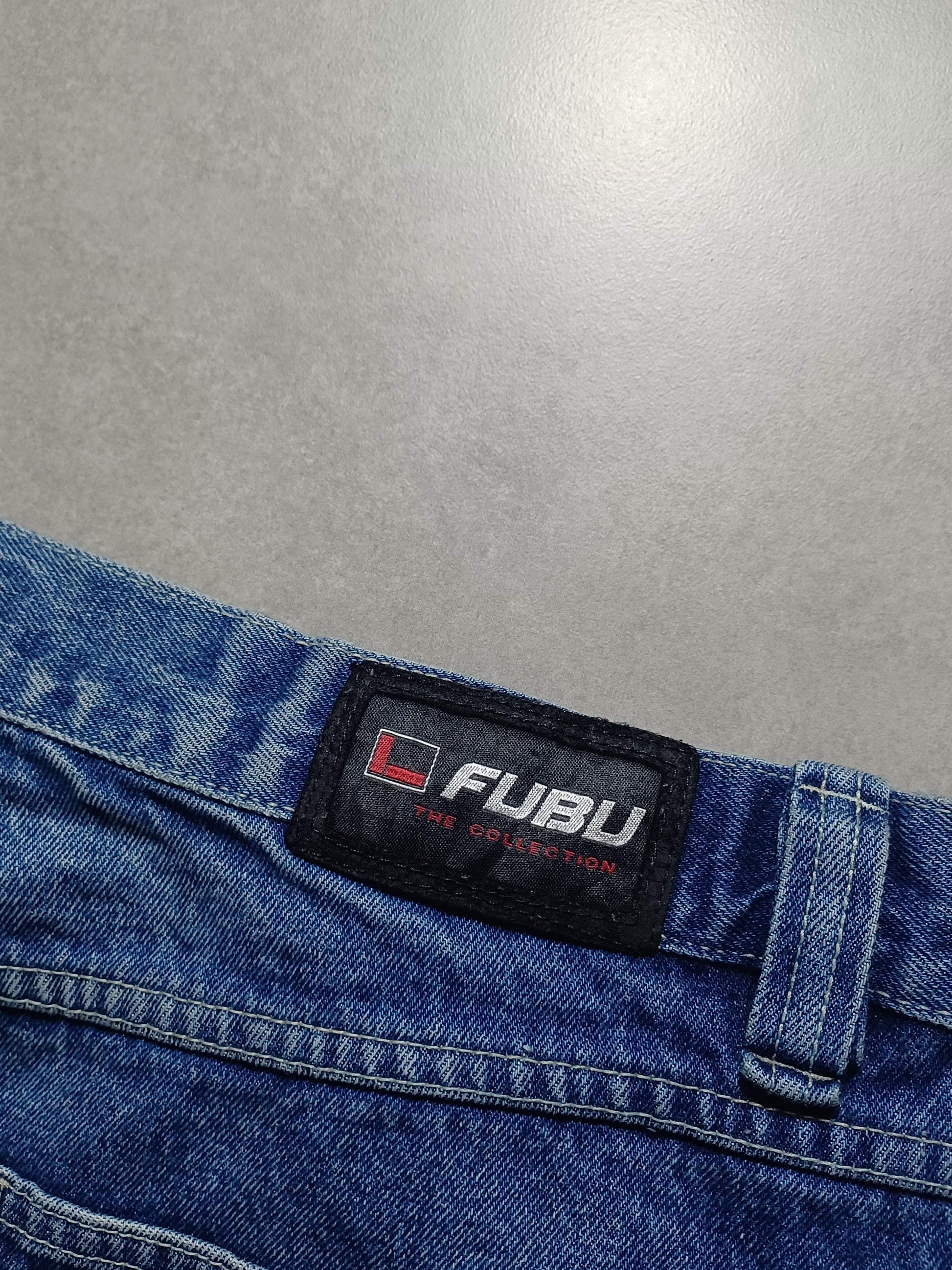 Niebieskie baggy jortsy FUBU