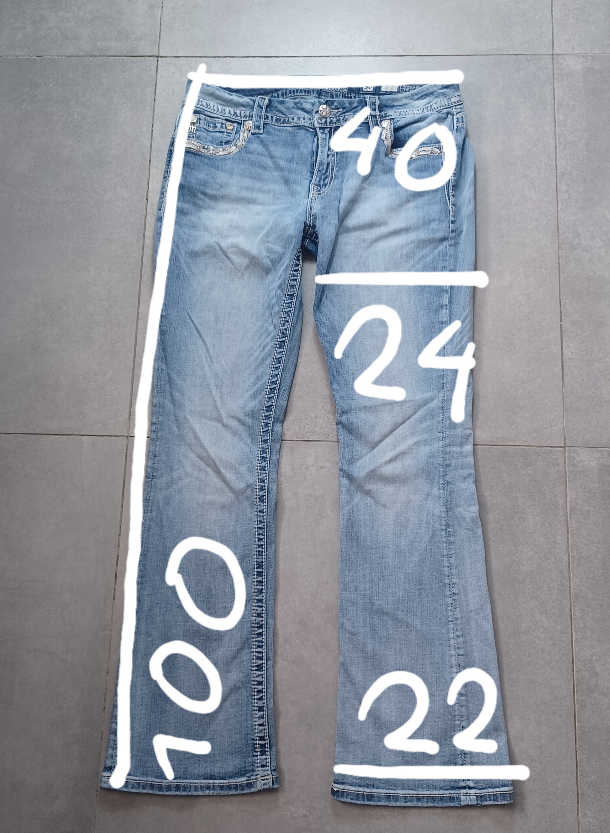 Jasnoniebieskie mid rise Bootcut jeans Miss Me