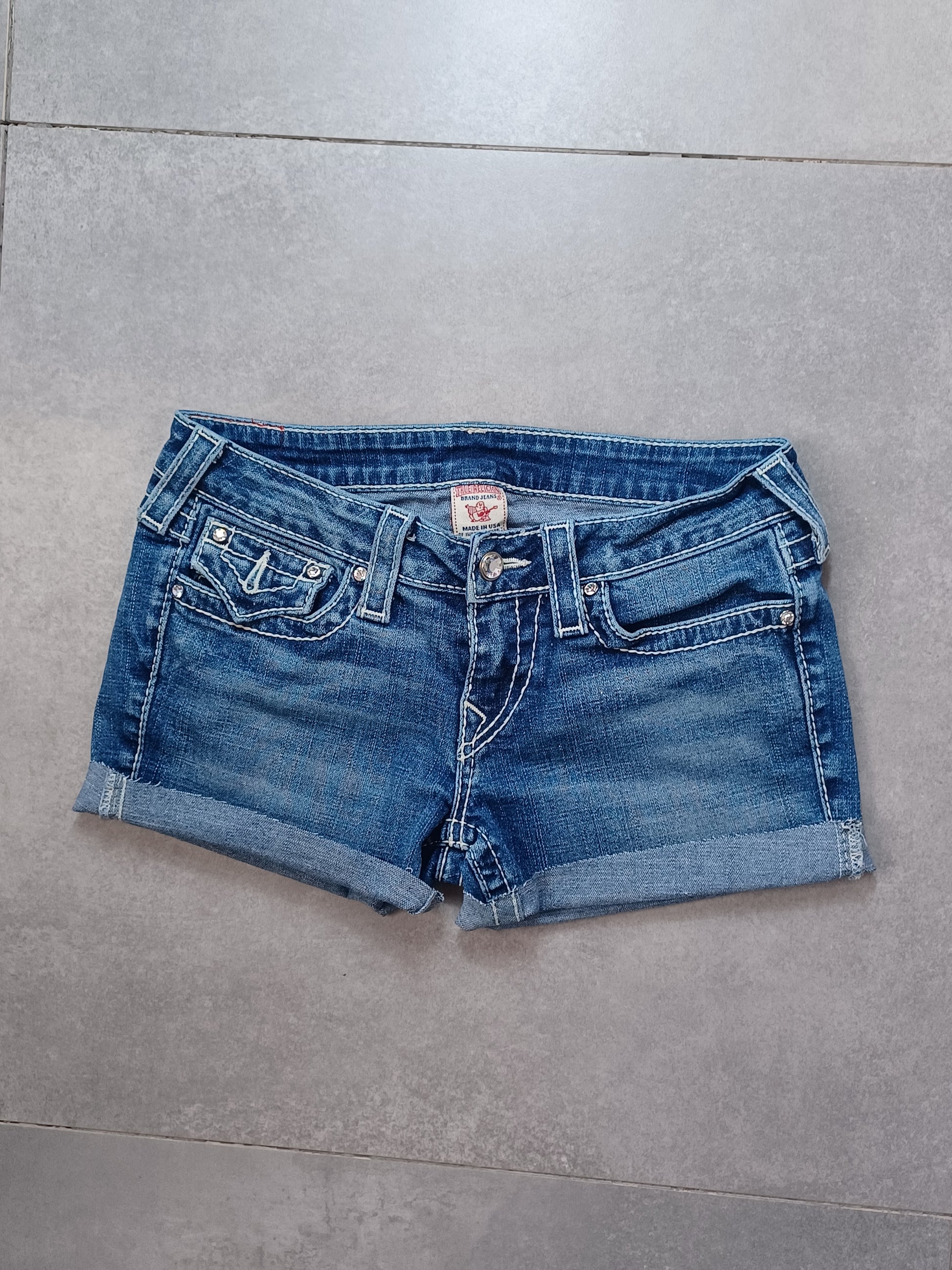 Niebieskie low rise szorty jeansowe True Religion x Swarovski
