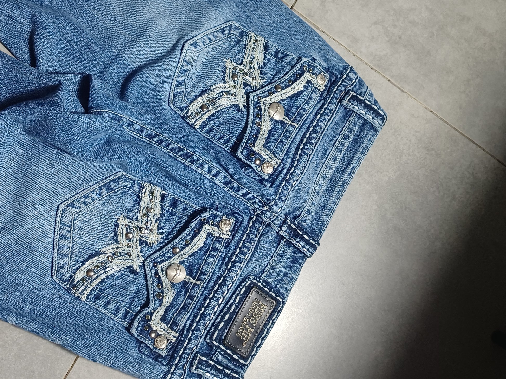 Niebieskie low rise Flared jeansy Miss Me