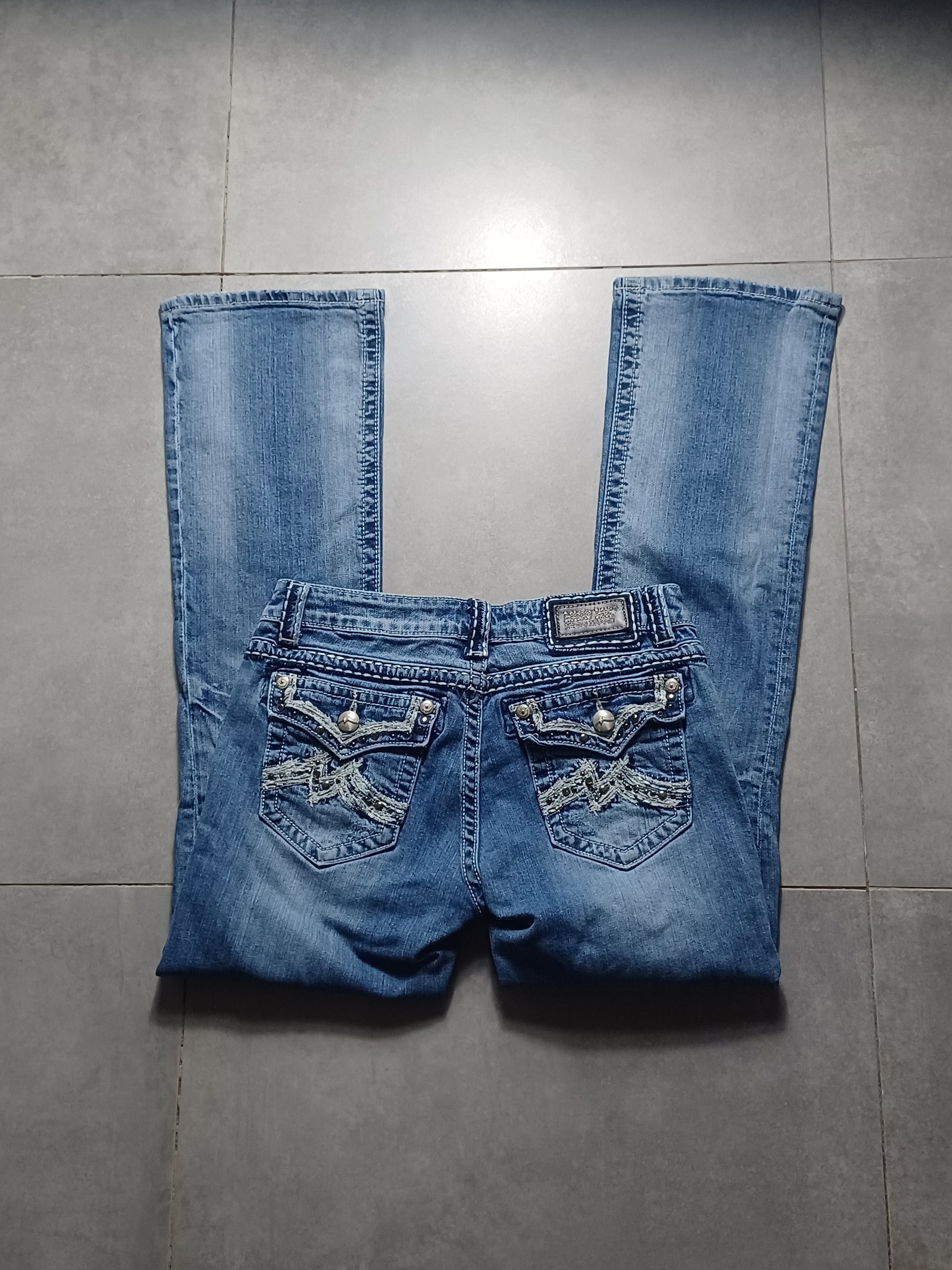 Niebieskie low rise Flared jeansy Miss Me