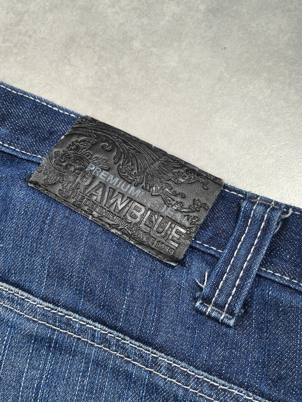 Granatowe spodnie jeansy loose fit  Raw Blue