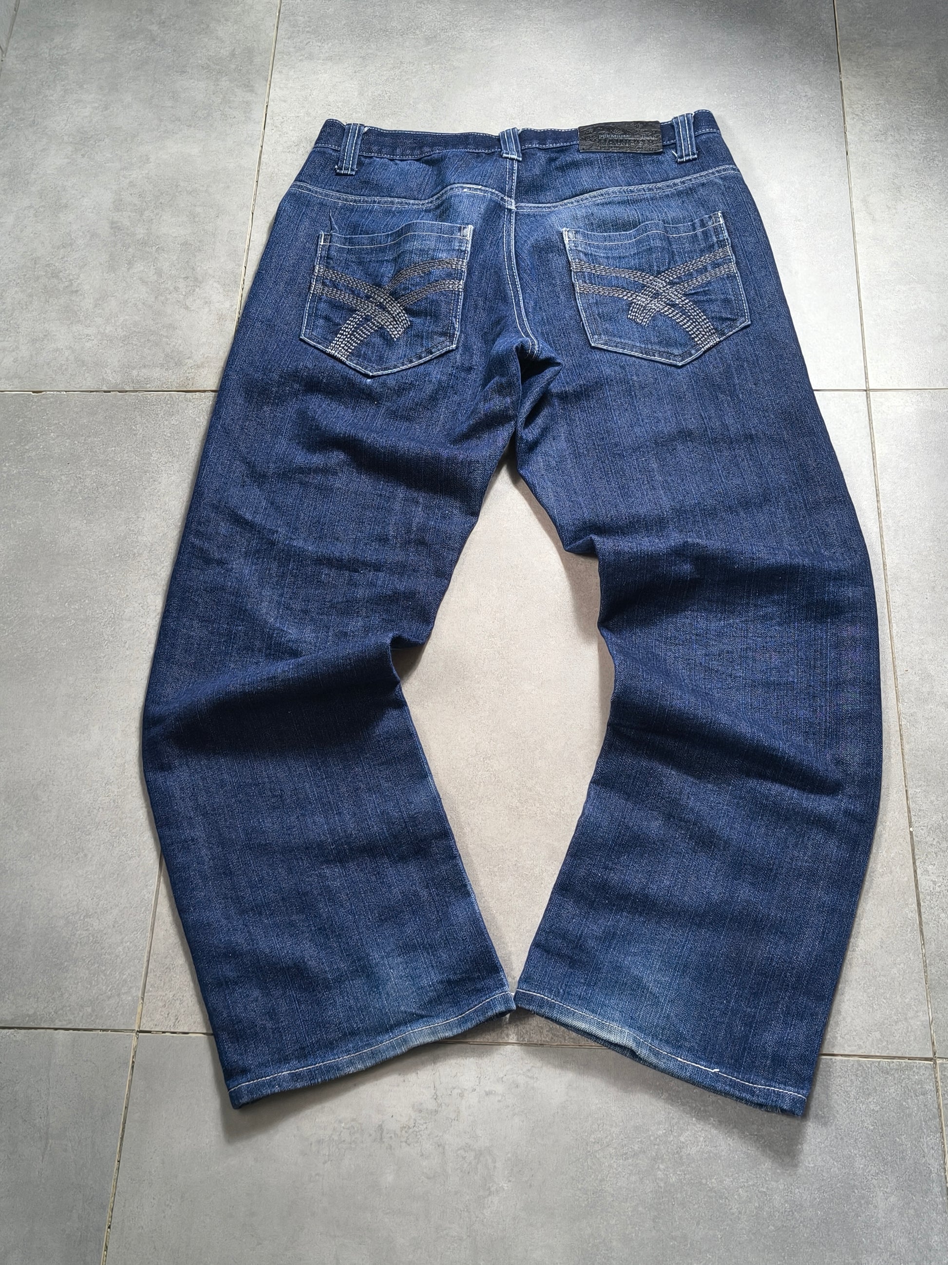 Granatowe spodnie jeansy loose fit  Raw Blue