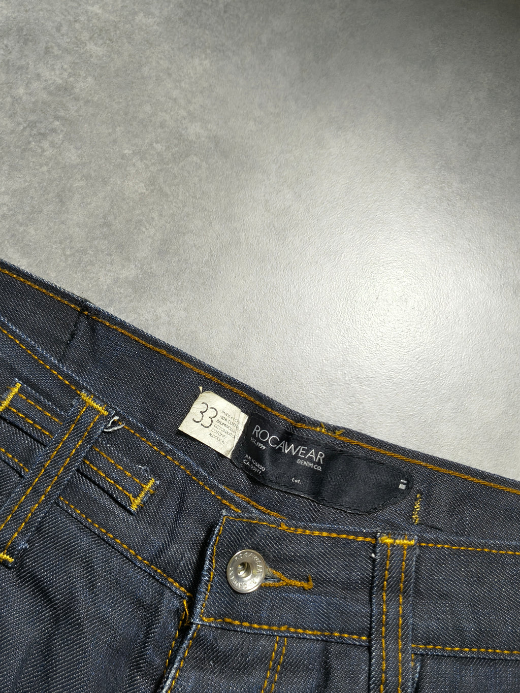 Granatowe straight fit jeansy Raw denim Rocawear