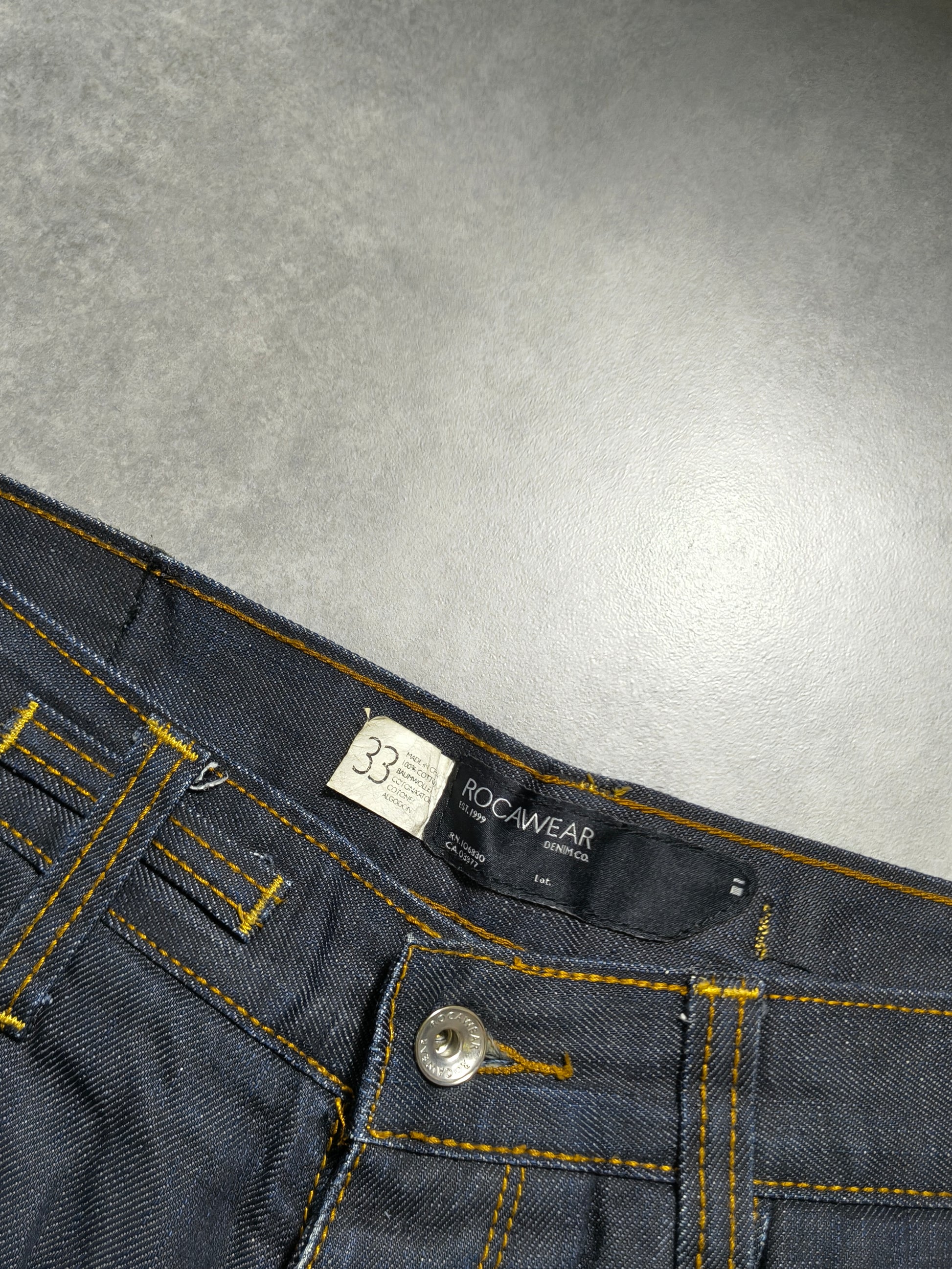 Granatowe straight fit jeansy Raw denim Rocawear