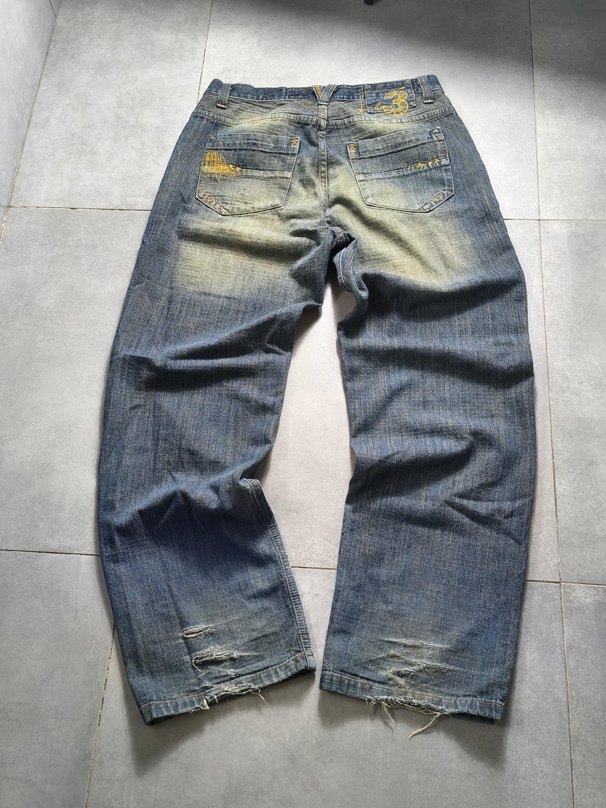 Niebieskie baggy jeansy B3 z żółtym washem