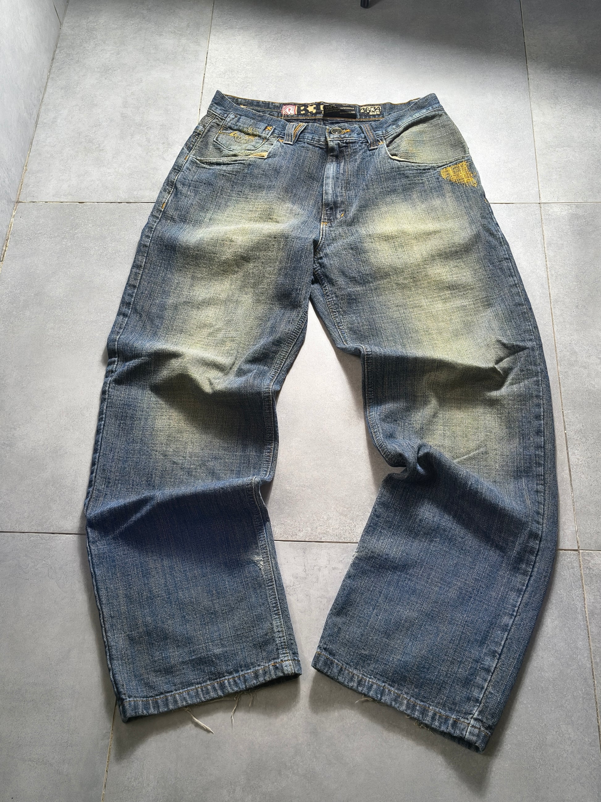 Niebieskie baggy jeansy B3 z żółtym washem