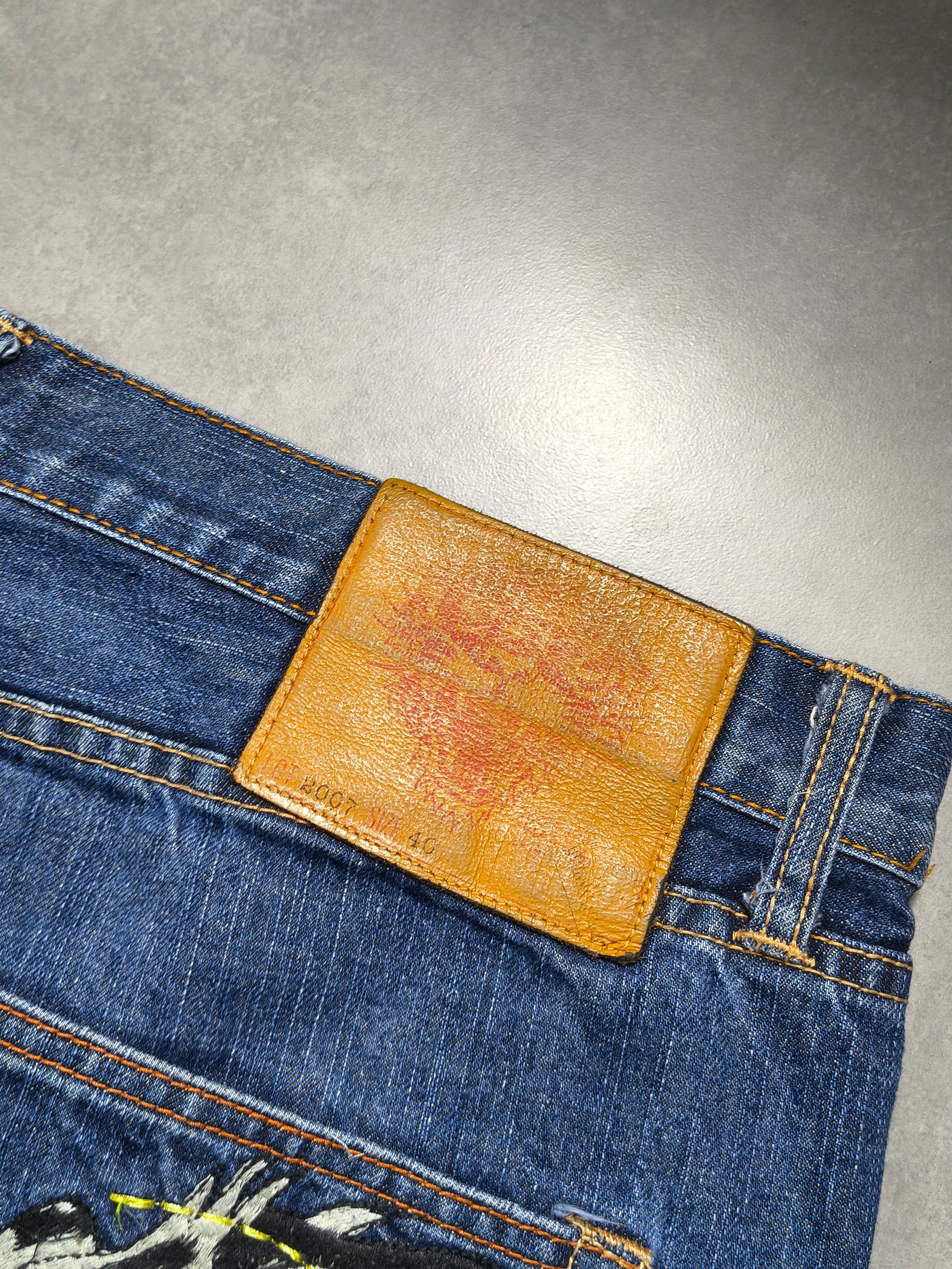 Granatowe baggy jeansy Ed Hardy