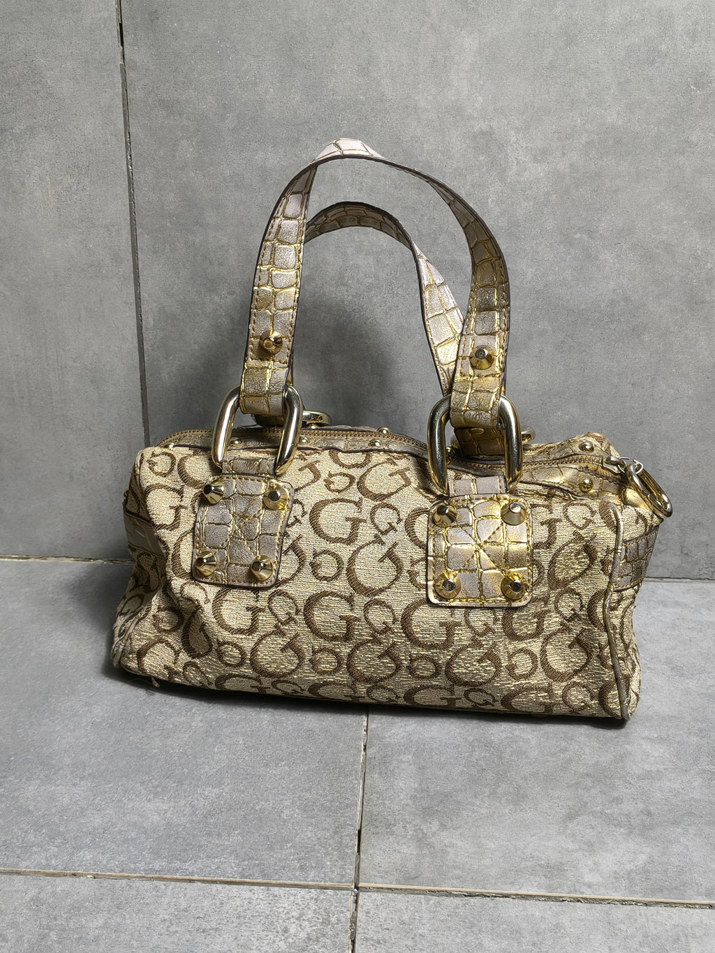 Złota torebka Guess