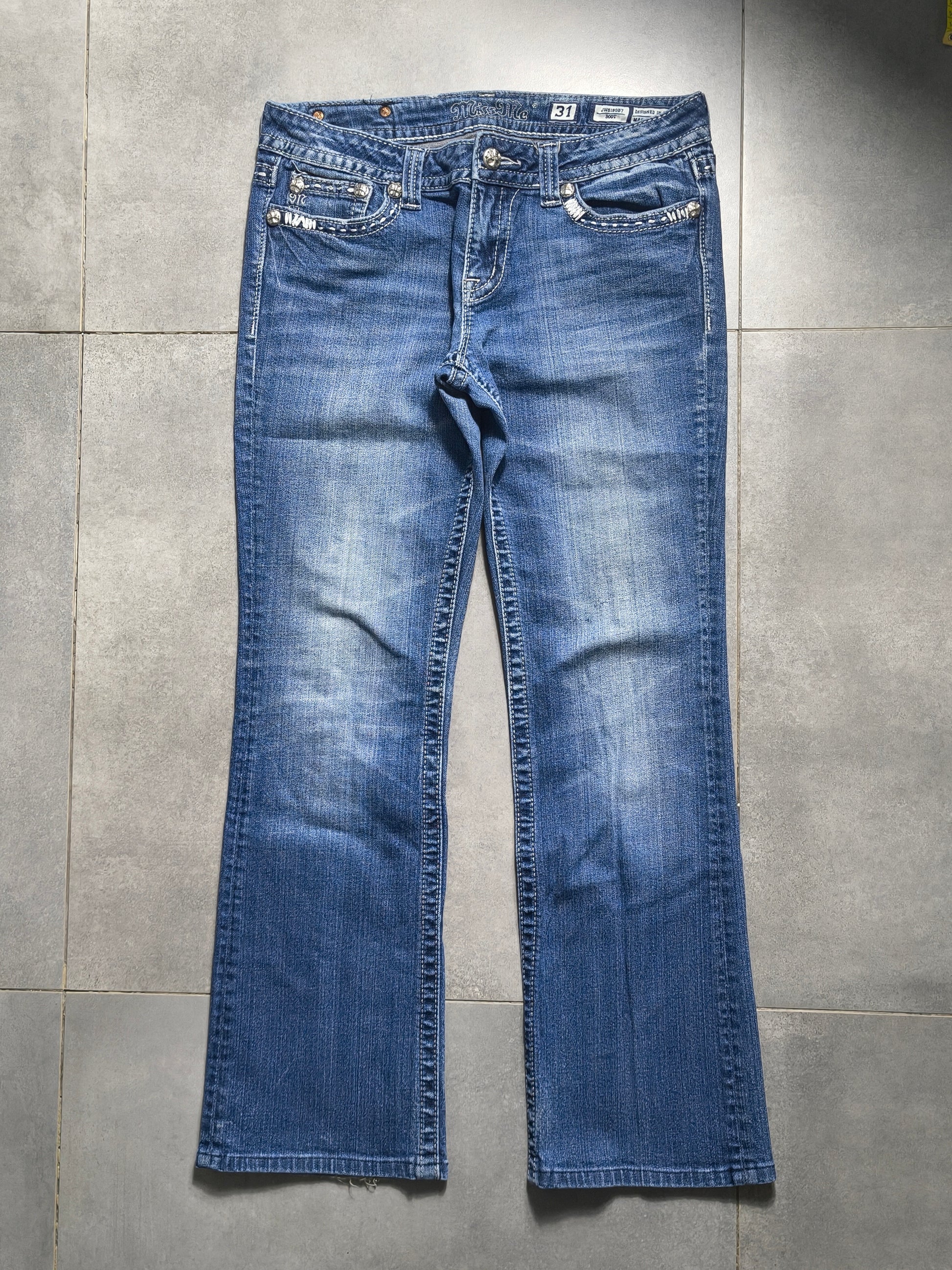 Granatowe flared jeansy Miss